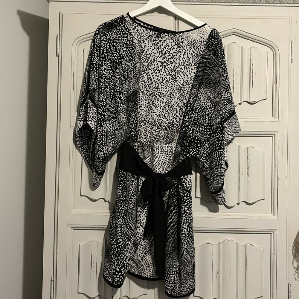 Cute Little black and white number. Mini dress with bat sleeves